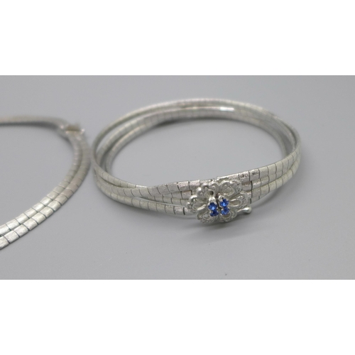 1103 - An 800 silver necklace and matching bracelet, 61g