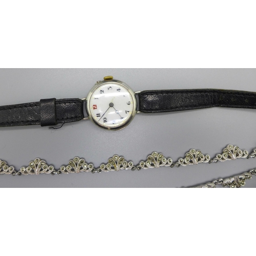 1108 - A c1900 white metal bangle, a necklet and a silver cased wristwatch