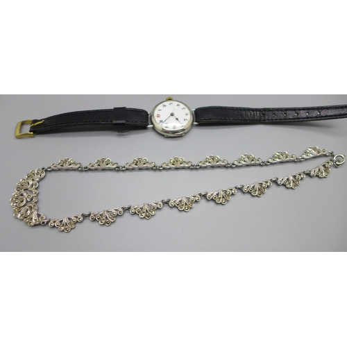 1108 - A c1900 white metal bangle, a necklet and a silver cased wristwatch