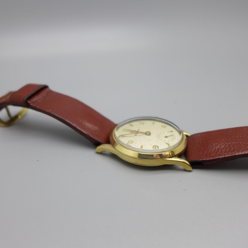 1113 - A 9ct gold Record wristwatch, the case back bears inscription dated 1957, 31mm case