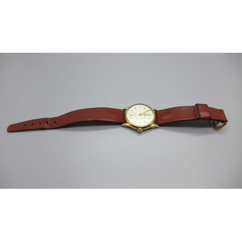 1113 - A 9ct gold Record wristwatch, the case back bears inscription dated 1957, 31mm case