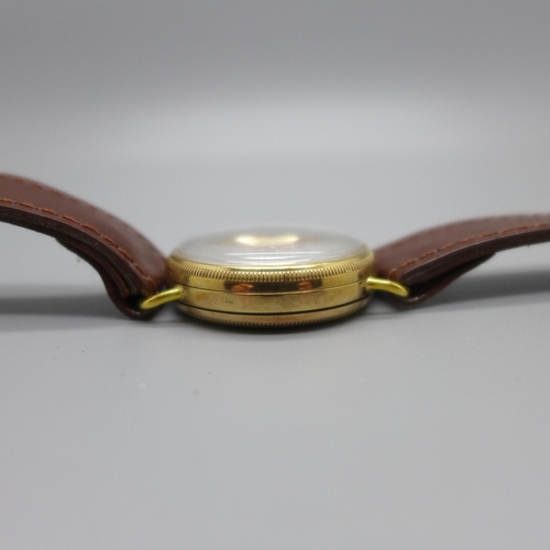 1114 - A 9ct gold cased Zenith wristwatch, Glasgow import mark for 1908, screw back 31mm case