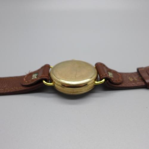 1114 - A 9ct gold cased Zenith wristwatch, Glasgow import mark for 1908, screw back 31mm case