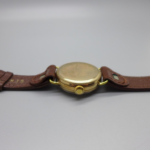 1114 - A 9ct gold cased Zenith wristwatch, Glasgow import mark for 1908, screw back 31mm case