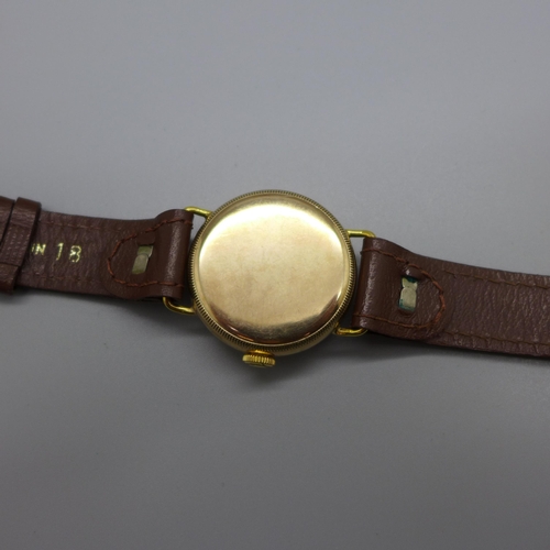 1114 - A 9ct gold cased Zenith wristwatch, Glasgow import mark for 1908, screw back 31mm case