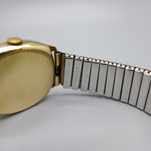 1115 - A 9ct gold cased Benson wristwatch, Birmingham 1955, 28mm case