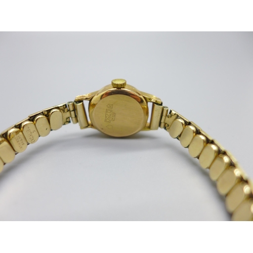 1125 - A lady's 18ct gold cased MuDu wristwatch on an expanding rolled gold bracelet strap