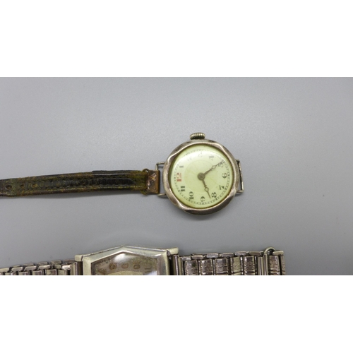 1128 - A German Laco silver cased wristwatch, London import mark for 1936, and a lady's silver wristwatch