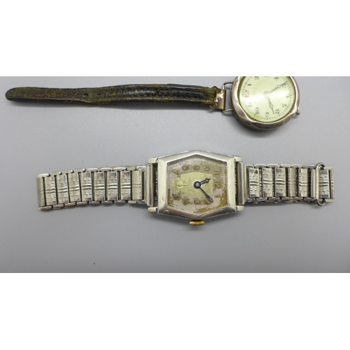 1128 - A German Laco silver cased wristwatch, London import mark for 1936, and a lady's silver wristwatch