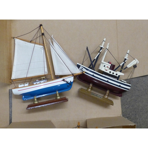 1156 - A collection of wooden model boats on stands  **PLEASE NOTE THIS LOT IS NOT ELIGIBLE FOR POSTING AND... 