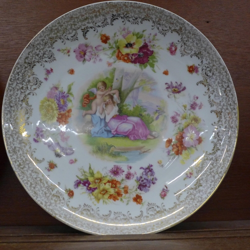 609 - Two plates stylistically attributed to Angelica Kauffman, 34cm