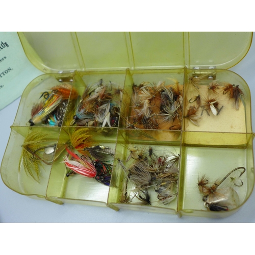 614 - A collection of fishing flies and a booklet 