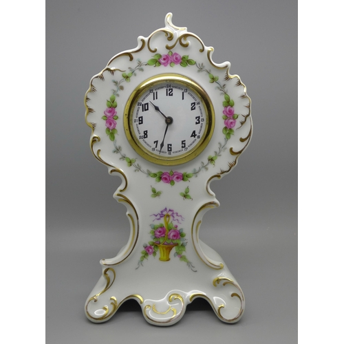 619 - A Rosenthal mantel timepiece, 22cm