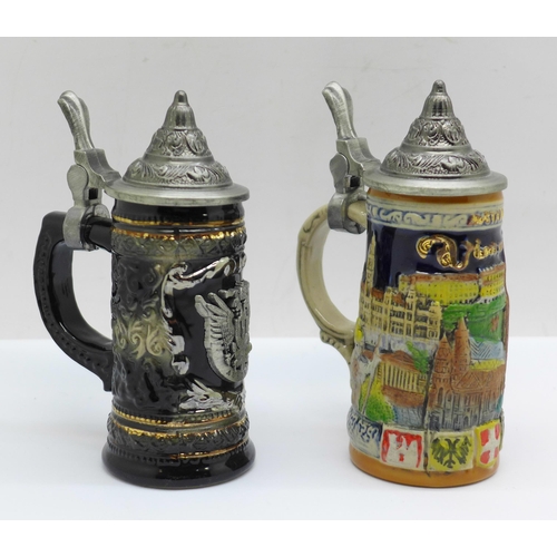 627 - Two small novelty German beer steins