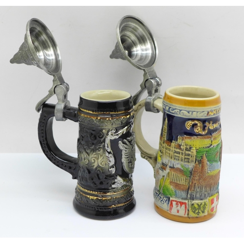 627 - Two small novelty German beer steins