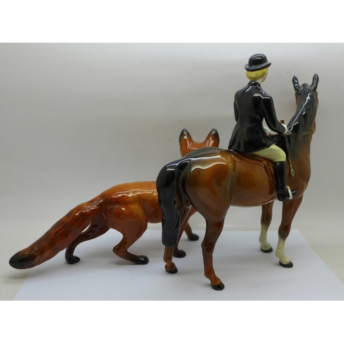 652 - A Beswick model of a horse and rider and a Beswick fox, tail a/f