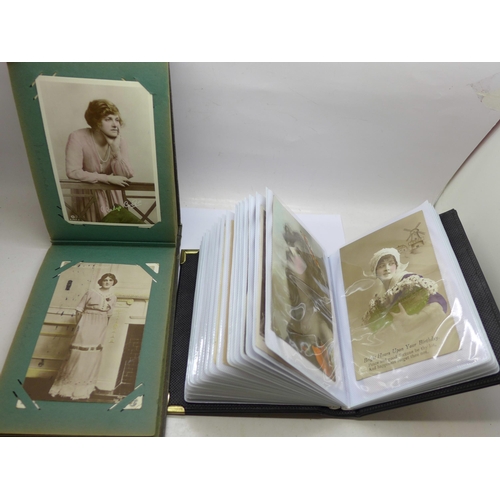 660 - Two albums of postcards, actresses, other photographic postcards of ladies and some greetings postca... 