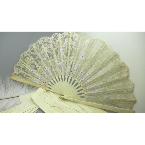 663 - An antique shell purse, an Edwardian lace fan, a headband and a pair of gloves