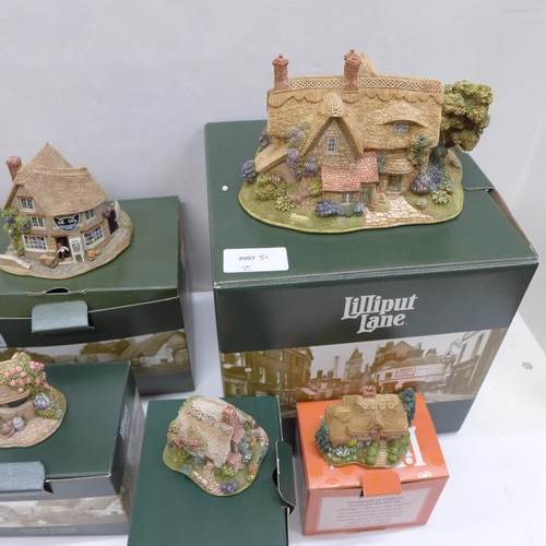 671 - A collection of boxed Lilliput Lane model cottages