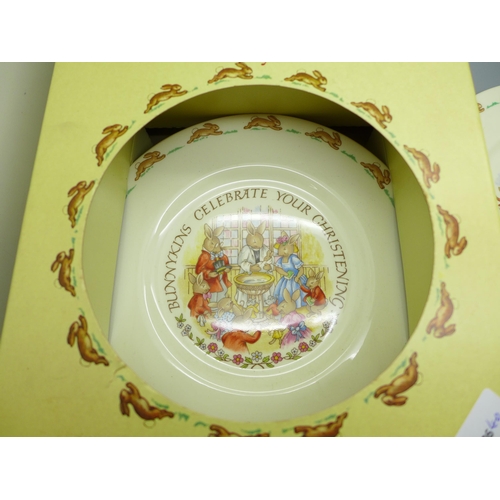 681 - A Royal Doulton Bunnykins china christening set, boxed and a Royal Doulton Bunnykins plate