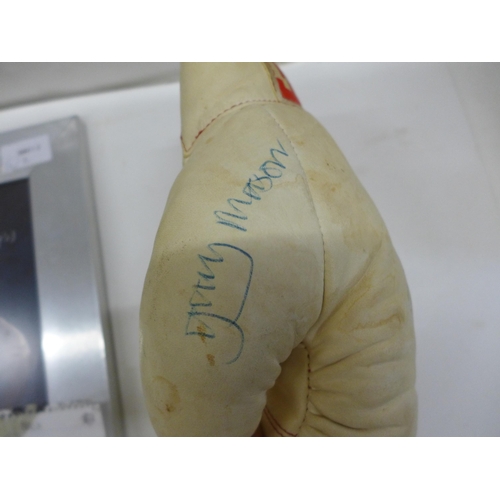 694 - A boxing glove with ten signatures of boxers from 1980's including Frank Bruno and a picture of Evan... 