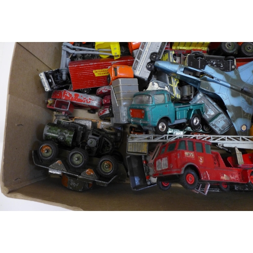 705 - A box of die-cast vehicles including Corgi and Lesney, playworn