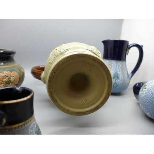 712 - A Bourne Denby puzzle jug, tobacco jar and four Lovatts stoneware jugs