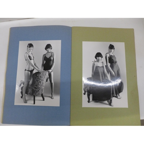 731 - An album of female modelling photographs and a folio of fashion designs