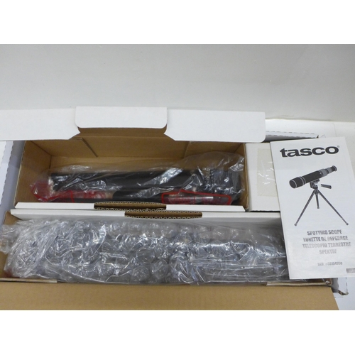 732 - A Tasco spotting scope with tripod, boxed, 15x-45 x 50mm