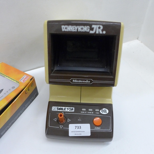 733 - An early 1980's Nintendo Donkey Kong Jr. game and a Panasonic stereo cassette player