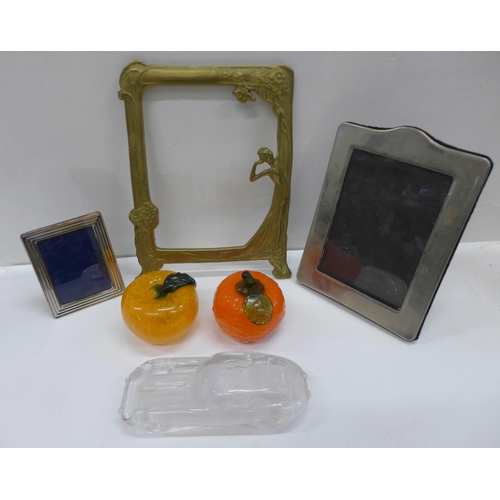 734 - An Art Nouveau style brass photograph frame, two silver plated photograph frames and three glass ite... 