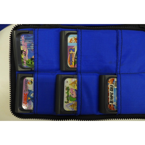 743 - A Sega Game Gear in Logic 3 carry case with five games including Sonic the Hedgehog and Sonic 2