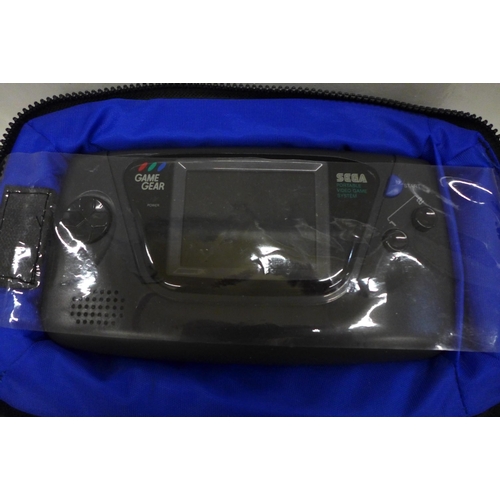 743 - A Sega Game Gear in Logic 3 carry case with five games including Sonic the Hedgehog and Sonic 2