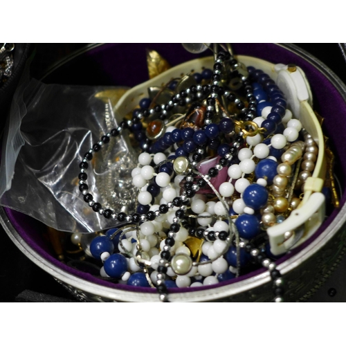 744 - A box of costume jewellery, etc.