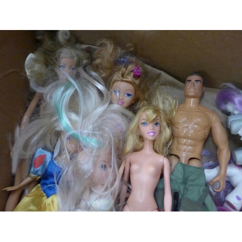 753 - Three Action Man figures, seven dolls including Barbie and twenty-one horse and unicorns including M... 