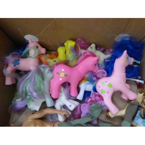 753 - Three Action Man figures, seven dolls including Barbie and twenty-one horse and unicorns including M... 