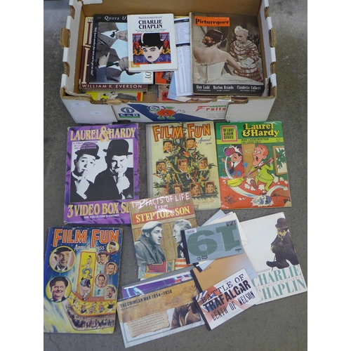 766 - Comedy Laurel and Hardy and Charlie Chaplin books, poster books, magazines, Royal Mail mint stamps, ... 