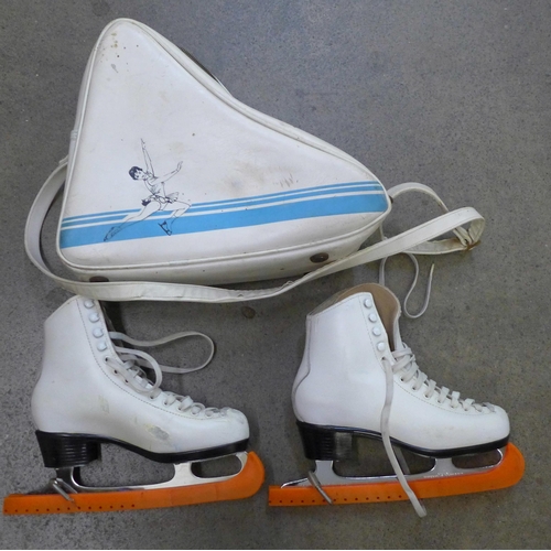 778 - A pair of silver Braza Fiesta stainless steel blade ice skates and a vintage vinyl bag