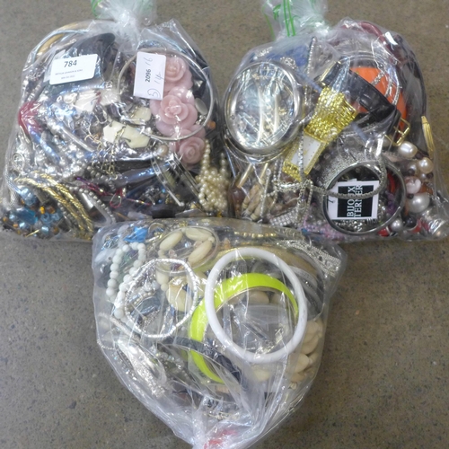 784 - Three bags of fashion jewellery