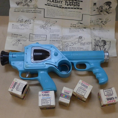 795 - A Marx Toys Flashy Flickers magic picture gun and five films