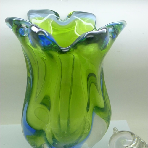 818 - A heavy coloured glass vase and four animal paperweights