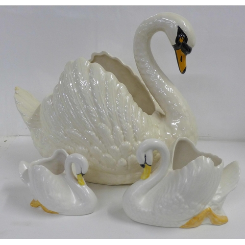 820 - A Dartmouth china swan figure and two Sylvac china swan figures, a/f