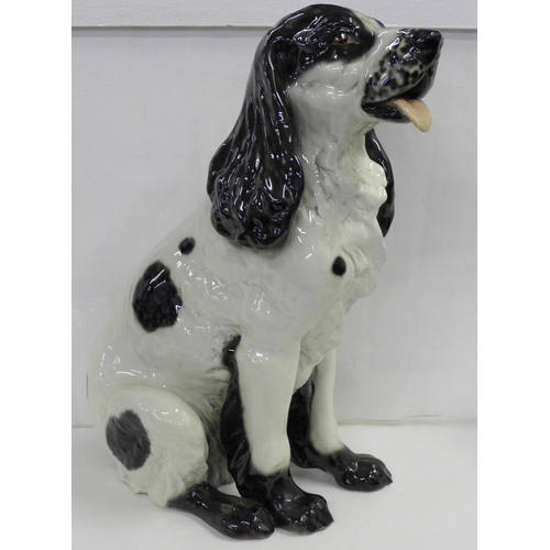 824 - A large china figure of a springer spaniel dog, 43.5cm