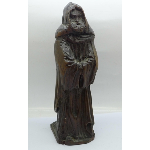 835 - A carved oak figure of John the Baptist, 23cm