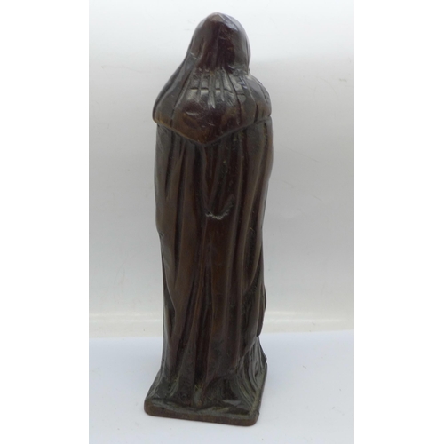 835 - A carved oak figure of John the Baptist, 23cm