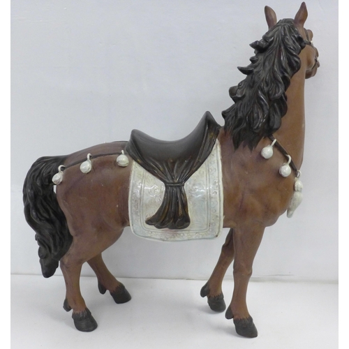 839 - A Chinese pottery horse, marked