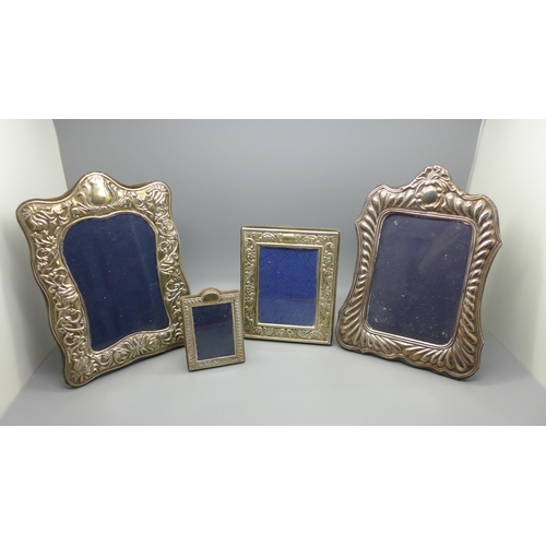 859 - Four hallmarked silver photograph frames, tallest 20cm