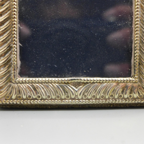 859 - Four hallmarked silver photograph frames, tallest 20cm