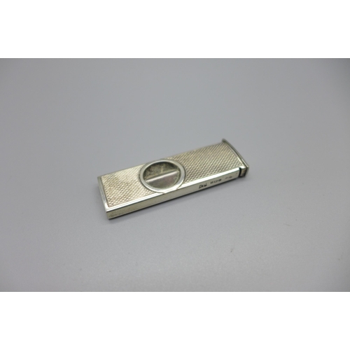 867 - A silver cigar cutter