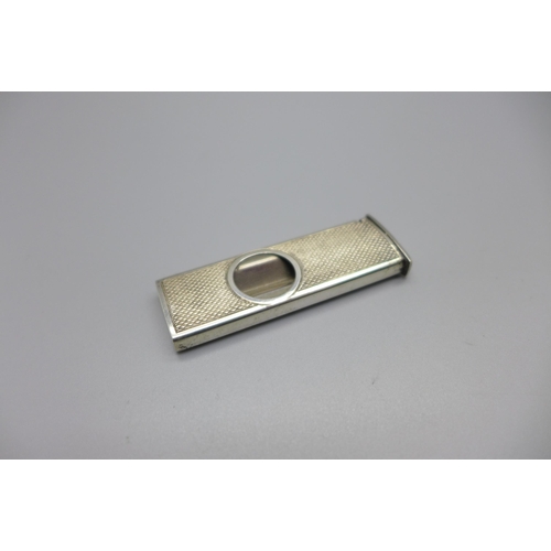 867 - A silver cigar cutter